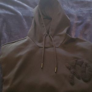 A black on black XO hoodie